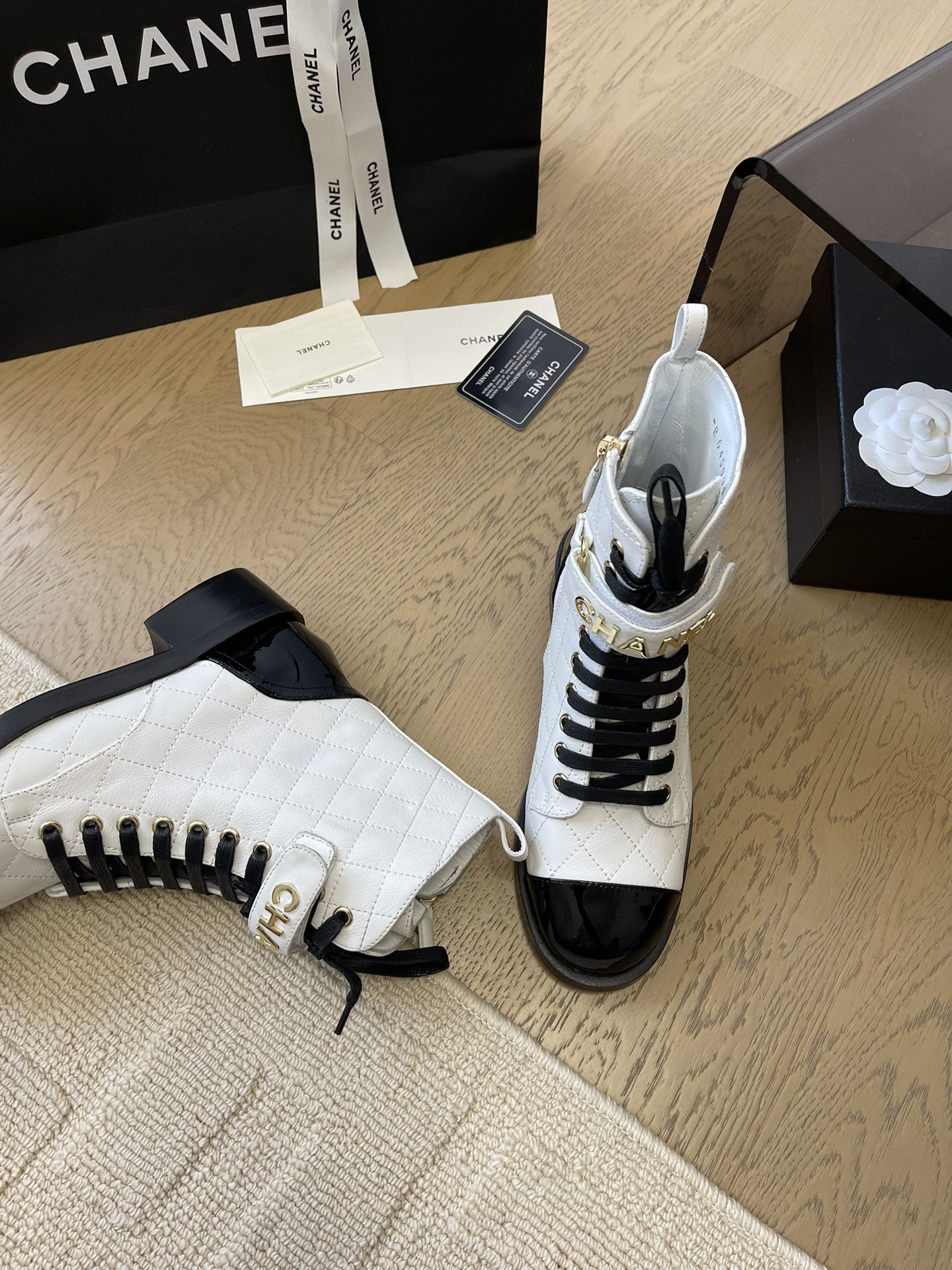 CHANEL ALPHABET MARTIN BOOTS IN WHITE LAMBSKIN